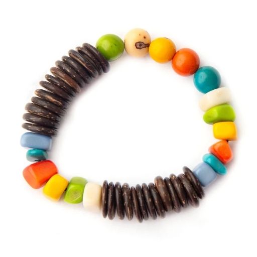 A multicolored bracelet made from vegetable ivory, featuring a variety of colorful tagua slices and dried acai berries strung together.