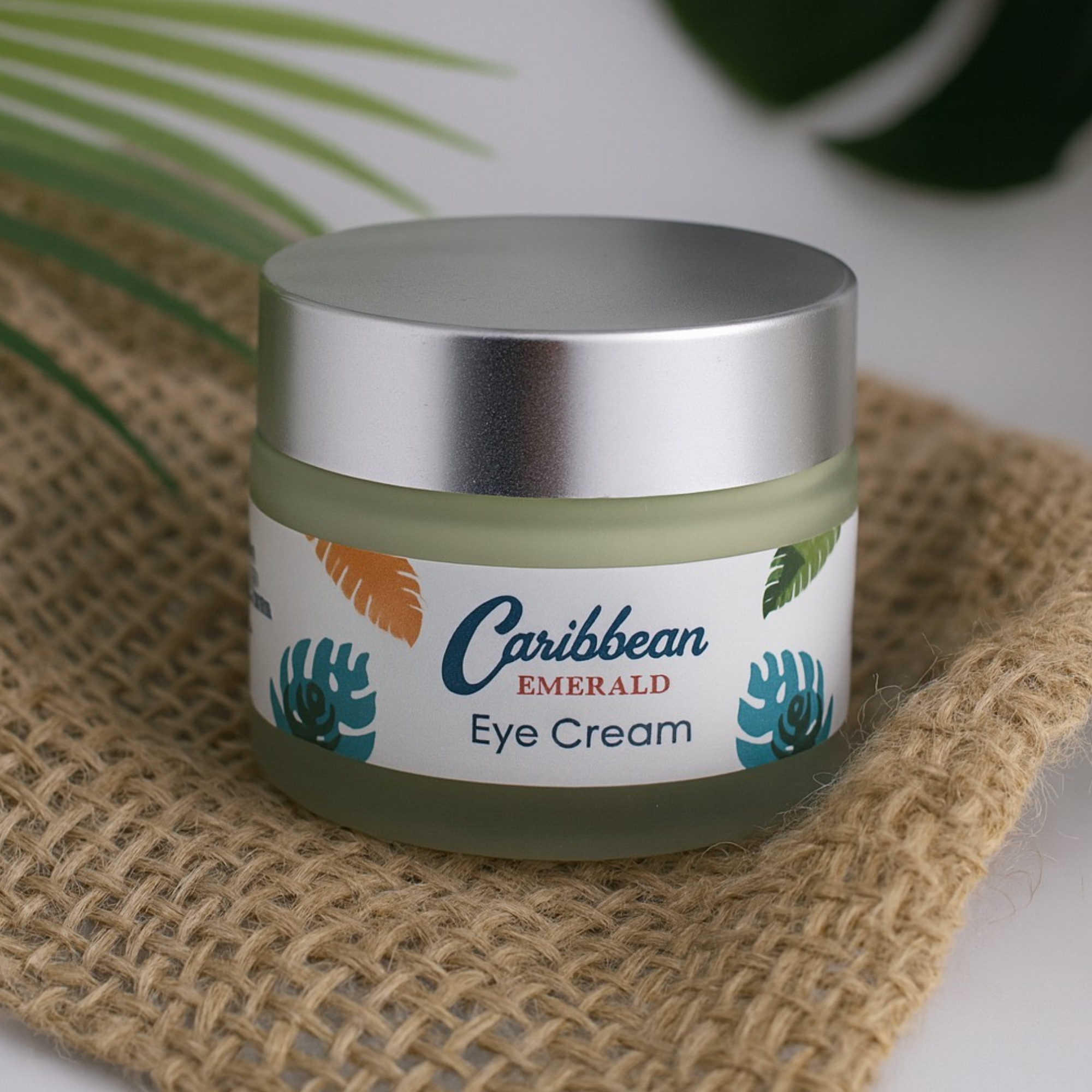 Caribbean Emerald Eye Cream packaging with tropical leaf design, 30ml bottle box.
