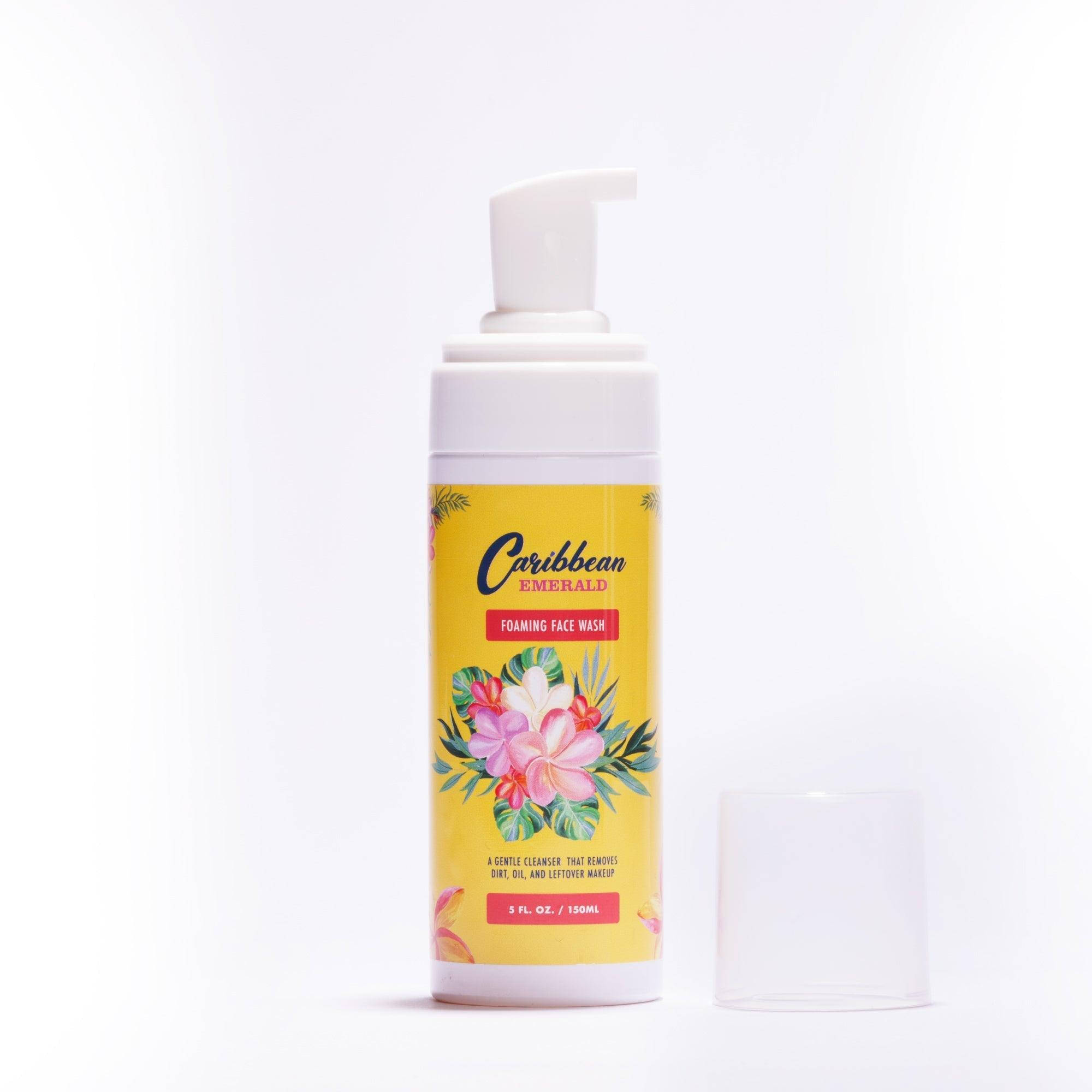 Caribbean Emerald foaming face wash bottle with floral design on a white background.