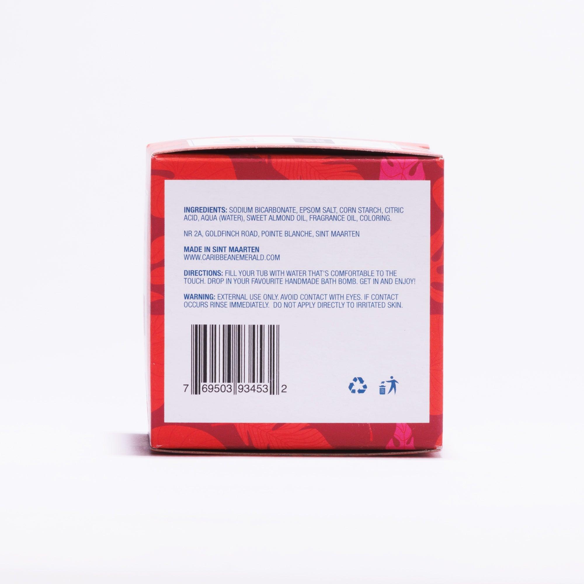 Back view of a pink product packaging showing ingredients and directions for a bath bomb.